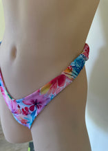 Load image into Gallery viewer, Multicolored floral bikini bottom on a blurred background