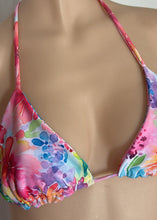 Load image into Gallery viewer, Colorful floral bikini top on a mannequin