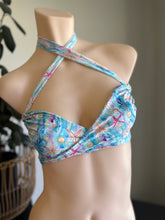 Load image into Gallery viewer, Colorful bikini top with starfish pattern on a mannequin against a neutral background