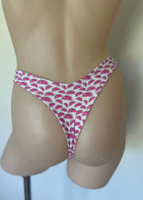 Load image into Gallery viewer, Mannequin wearing a pink and white patterned thong against a plain background