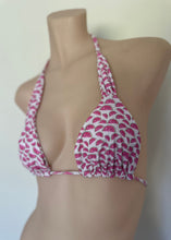 Load image into Gallery viewer, Pink and white patterned bikini top on a mannequin against a plain background