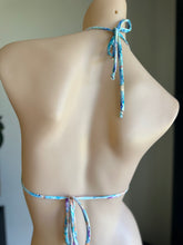 Load image into Gallery viewer, Mannequin wearing a blue and white patterned bikini with a plain background