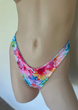 Load image into Gallery viewer, Colorful floral bikini bottom on a neutral background