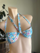 Load image into Gallery viewer, Multicolored bikini top on a mannequin against a neutral background
