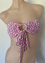 Load image into Gallery viewer, Pink and white patterned bandeau top on a mannequin against a plain background