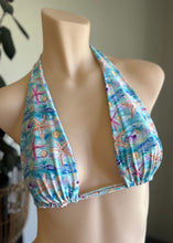 Load image into Gallery viewer, Colorful bikini top with starfish pattern on a mannequin against a neutral background