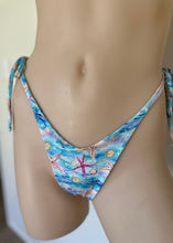 Load image into Gallery viewer, Bikini bottom with starfish and shell pattern on a neutral background