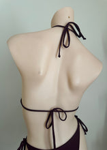 Load image into Gallery viewer, Mannequin wearing a black bikini with thin straps on a plain background
