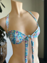 Load image into Gallery viewer, Multicolored bikini top on a mannequin against a neutral background
