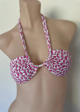 Load image into Gallery viewer, Pink and white patterned bikini top on a mannequin against a plain background
