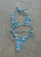Load image into Gallery viewer, Blue patterned bikini set on a gray surface
