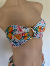 Load image into Gallery viewer, Floral bikini top on a mannequin with a white background
