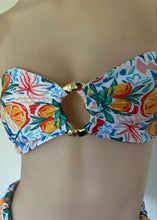 Load image into Gallery viewer, Colorful floral bow hair tie with gold clasp on a neutral background
