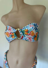 Load image into Gallery viewer, Floral bandeau bikini top on a mannequin against a plain background
