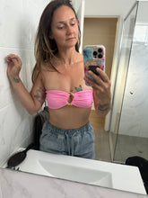 Load image into Gallery viewer, Person taking a mirror selfie wearing a pink top and denim shorts in a bathroom.

